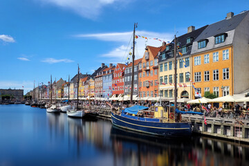 Boats and colorful buildings in Nyhavn Harbor (or New Port), Copenhagen, Denmark