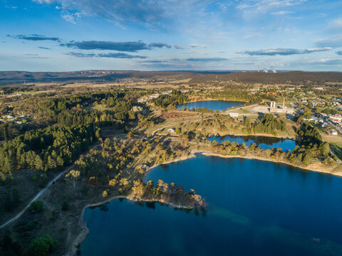 Aerial view over old quarry now a lake and Portland Cement Works