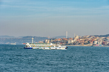 Obraz premium View of Bosphorus Bridge and boats in Istanbul, Turkey.