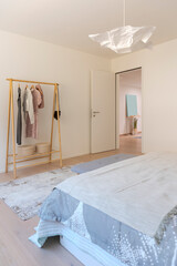 Detail of bedroom with clothes hanger - 779879064