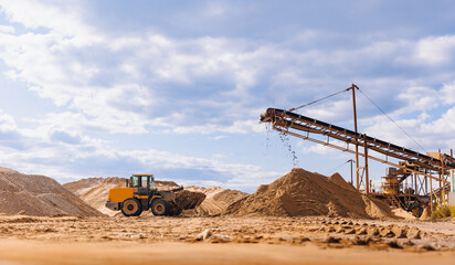 Banner Sand quarry, Industrial plant with belt conveyor in open pit mining. Construction site,...