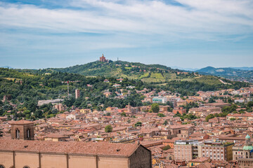 Aerial view of Bologna architecture with Santuario della Madonna di San Luca in mountain in skyline, ITALY © Liliana