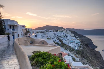 Foto auf Acrylglas Sunset in Oia on the Greek island of Santorini © Chris