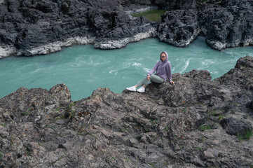 Woman at the river Katun