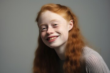 Studio portrait of a smiling confident young woman