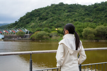 Woman look at the water lake in Yilan of Taiwan