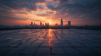 Dawn breaks over an empty city square smooth stone tiles in the foreground with a stunning skyline silhouette against the awakening sky - obrazy, fototapety, plakaty