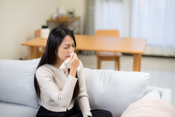 Woman suffer from influenza at home