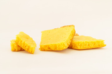 Corn tortillas and ingredients on white background