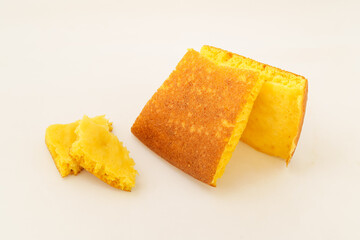 Corn tortillas and ingredients on white background