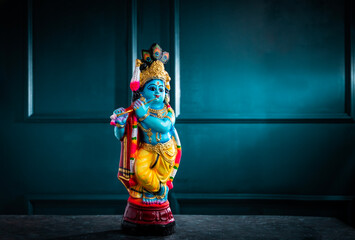 Obraz premium Lord Krishna image with copy space, Vishu Kani concept background
