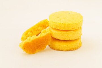 Corn tortillas and ingredients on white background