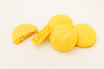 Corn tortillas and ingredients on white background