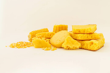Corn tortillas and ingredients on white background