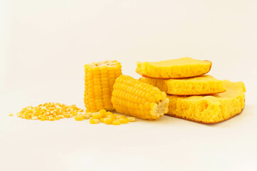 Corn tortillas and ingredients on white background