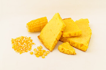 Corn tortillas and ingredients on white background