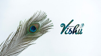 Peacock feather isolated on white background with Vishu greetings, Happy Vishu background