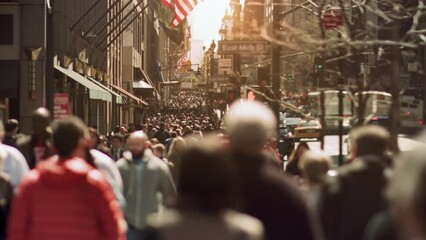 Bustling Crowded City with Anonymous Pedestrian People Walking. Daytime. Manhattan Busy Street. New York, United States. Traffic Passing By.  