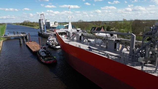 Aerial video of cargo ships in Appingedam Netherlands