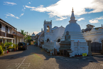 On a city street at the ancient Buddhist temple of the Sri Sudharmalaya. Galle, Sri Lanka - 779922046