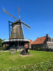 Windmill in Sloten, Friesland - obrazy, fototapety, plakaty