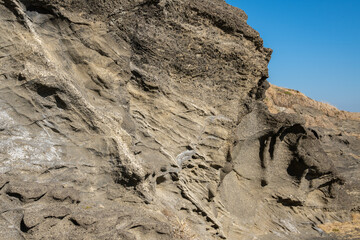 Craggy seaside rock wall