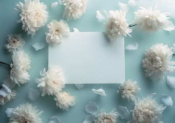Elegant White Flowers Arrangement on Pastel Blue Background