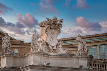 Architectural detail in the Vatican featuring a grand crest flanked by angels. Serene atmosphere...