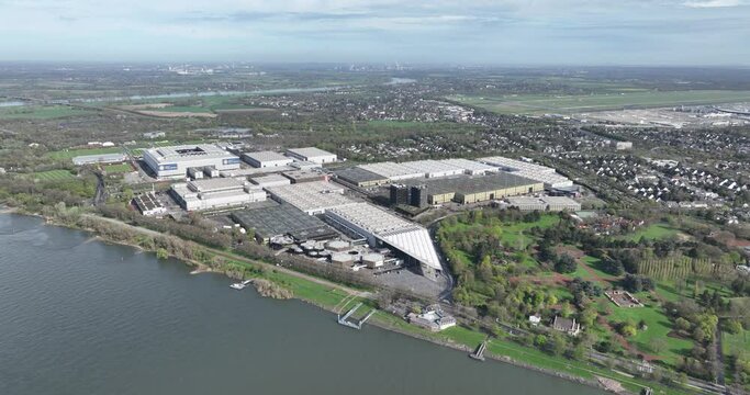 Dusseldorf messe, business conference and exhibition hall where trade fairs and events take place. Business to business meeting place. Aerial drone overview.