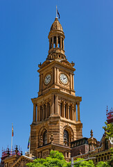Fototapeta na wymiar The historical bell tower of Sydney Town Hall, Australia