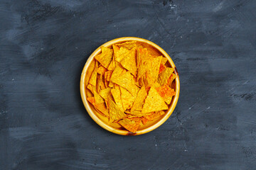 Yellow Bowl Filled With Tortilla Chips. Flat lay