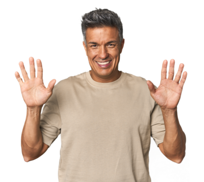Middle-aged Latino man showing number ten with hands.