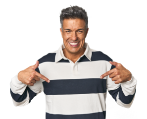 Middle-aged Latino man surprised pointing with finger, smiling broadly.