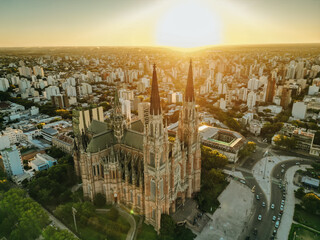 Cathedral of Jesus, La plata, aerial top view on rooftop. Church architecture on sunset
