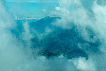 Bright panorama of the cloudy Andes Mountains from the Cerro las Nubes, Mount of the Clouds, in...