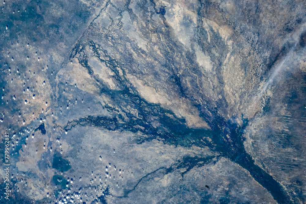 Wall mural land features in botswana. digital enhancement of an image by nasa