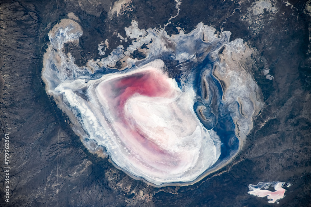 Wall mural land feature with pink colors in argentina. digital enhancement of an image by nasa