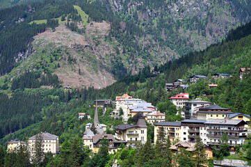 Buildings in the forest on the mountain Bad Gastein Austria - 779968498