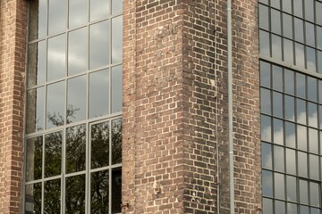Details of an old industrial building, brick wall and windows, approx. 100 years old
