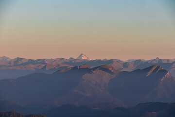 Panoramic sunrise view from summit Dobratsch on High Tauern (Hohe Tauern) in Austria, Europe....