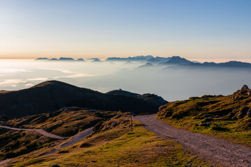 Panoramic hiking trail at sunrise to summit Dobratsch in Carinthia, Austria, Europe. View of...