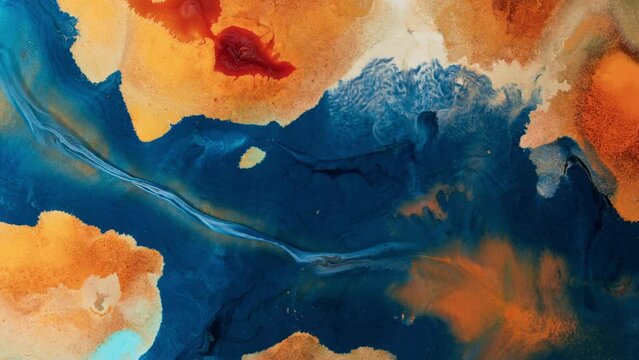 Wallpaper video with abstract liquid color painting. In the style of fluid art with slow river flow. Flowing paint turquoise and amber colors, birds-eye-view