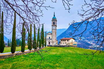 St Abundius (Sant'Abbondio) Church and cypress trees, Collina d'Oro, Ticino, Switzerland