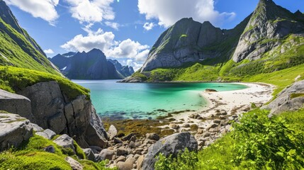 A beautiful mountain range with a lake and a beach. The mountains are covered in green grass and the beach is sandy. The sky is clear and the sun is shining. The scene is peaceful and serene - obrazy, fototapety, plakaty