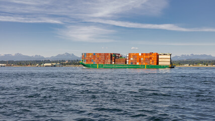 Large Cargo ship carrying industrial containers on the sea - 779987427