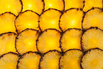 Fresh ripe sliced pineapple closeup - 779991023