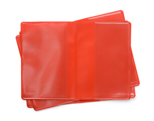 Empty red plastic passport protective covers
