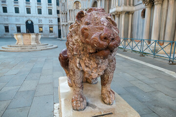 Close up view of red marble lions in the Piazzetta dei Leoncini at St Mark's Square, Venice,...