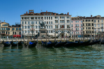 Gondolas parked in front of Londra Palace Venezia near San Marco square, Venice, Veneto, Northern...