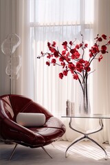 Red armchair, red flowers, modern room, peaceful scene.

